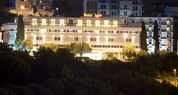 Hotel Front - Evening or Night
